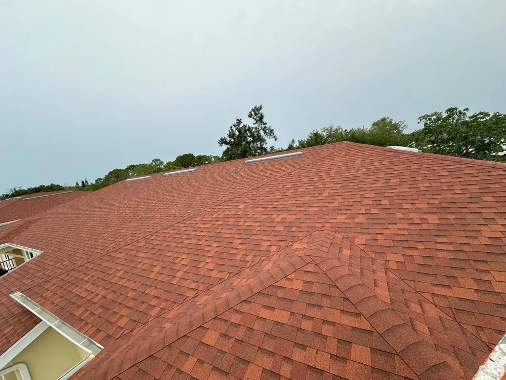Close-up of a new terracotta-colored shingle roof