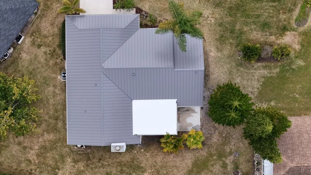 Aerial view of a new metal roof on a home in St. Petersburg, FL